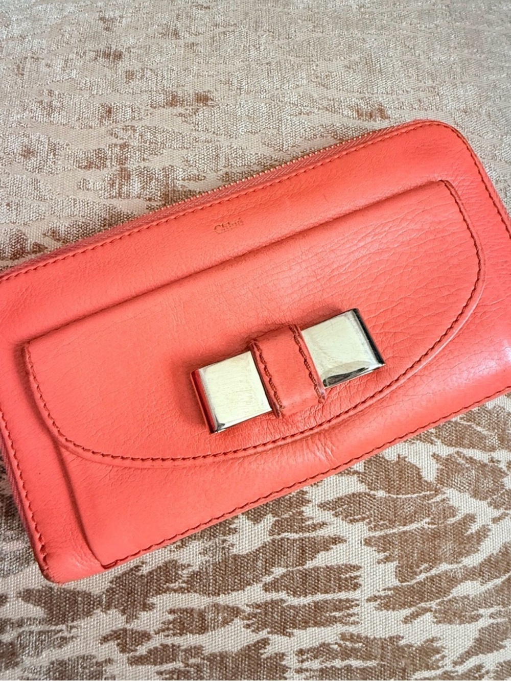 Chloe Coral Pink Leather Zip Clutch Wallet with Silver Bow Accent EUC
